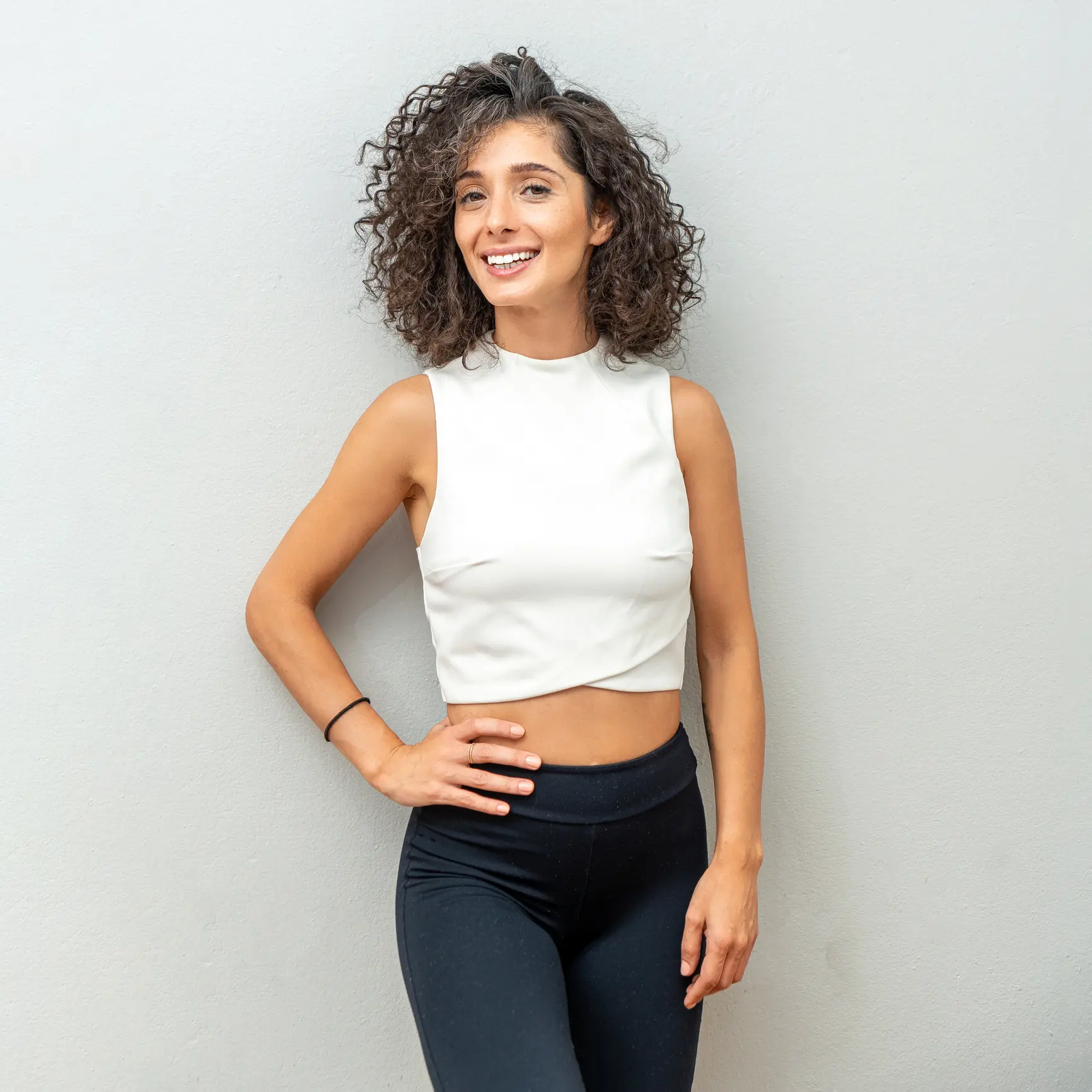 Woman smiling in athletic wear
