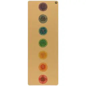 Chakras Aura cork yoga mat with fine-grain cork surface, rolled out on studio floor
