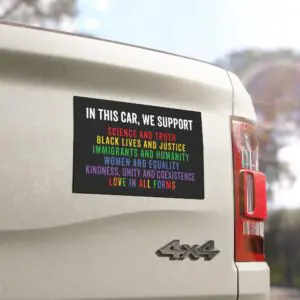 Car bumper magnet listing values: science, justice, equality, kindness, immigrants, pride